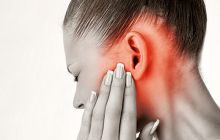 Біль у вусі: чому виникає і як допомогти